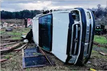  ?? LT. BILL DAVIS / BOSSIER PARISH SHERIFF’S OFFICE ?? The National Weather Service estimated a tornado with around 135 mph winds touched down Friday night in Bossier Parish, Louisiana, causing damage such as this.