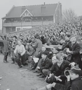  ?? PA ?? Boys’ own story: Fulham fans take in the action in an FA Cup tie against Bristol Rovers at Craven Cottage in 1958