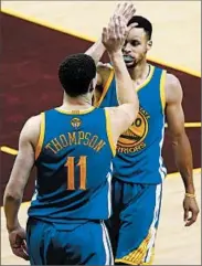  ?? LARRY W. SMITH/EPA ?? Warriors guards Stephen Curry and Klay Thompson hope to close out the Cavaliers on Monday night in Oakland.