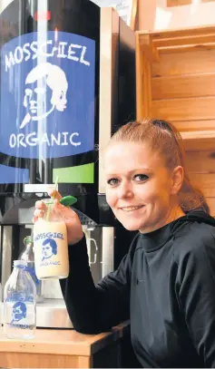  ??  ?? White stuff Jingers Jane Hynes with her organic milk dispenser