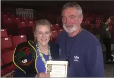  ??  ?? Nicole Moorehouse of Clonard Boxing Club with her coach, TomHayes, after winning the Irish Under-22 57 kg. title at the National Stadium.