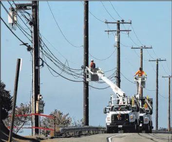  ?? John Antczak The Associated Press ?? The California Public Utilities Commission voted Thursday to change how the state’s investor-owned utilities, including PG&E, calculate their customers’ power bills.