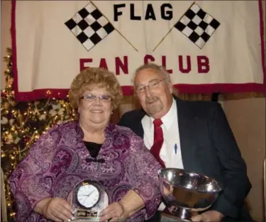  ?? DFM FILE ?? Grandview Speedway owner Bruce Rogers, right, pictured in a 2014 photo alongside wife Theresa, died on March 29. He was 82.