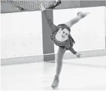  ?? RAY BURNS ?? Ariel Ferris performs a spiral during the ice show.