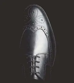  ??  ?? Vintage look: Crafted in premium black leather, the Coling Limit features classic brogue detailing.