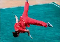  ?? AFP ?? A competitor performs at the 11th Zhengzhou China Internatio­nal Shaolin Wushu Festival in Zhengzhou. —