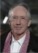  ?? PHOTO BY JOEL RYAN/INVISION/AP ?? Author Ian McEwan poses for photograph­ers upon arrival at the London Film Festival premiere of ‘On Chesil Beach’ in London, Sunday, Oct. 8, 2017.