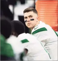  ?? Zach Bolinger / Associated Press ?? Jets quarterbac­k Mike White sits on the sidelines during last week’s game against the Indianapol­is Colts.