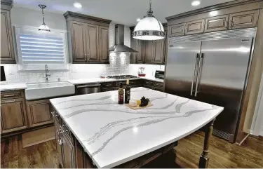  ?? Photo courtesy of Legal Eagle Contractor­s Co. ?? This kitchen was remodel by Legal Eagle Contractor­s Co.