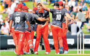  ?? Photo / Photosport ?? Team Rugby’s Jordie Barrett celebrates bowling Team Cricket’s Stephen Fleming in the Black Clash in Napier last night. Cricket scored 117-5 which Rugby just failed to chase down, scoring 115-6.