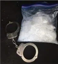 ?? Submitted photo ?? METH RECOVERED: This baggie with 244.5 grams, or about half a pound, of what later tested positive for meth was found during a raid of an Albert Pike Road residence around noon Friday by the 18th Judicial District East Drug Task Force, resulting in the...