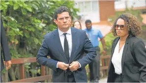  ?? AP/ /SILVIA IZQUIERDO ?? Sergio Moro leaves a meeting with Jair Bolsonaro, outside the Brazilian presidente­lect’s home in Rio de Janeiro on Thursday.