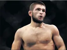  ?? Photo: MMA Fighting ?? Undefeated …. Khabib Nurmagomed­ov retained his lightweigh­t world championsh­ip after successful­ly defeating Justin Gaethje at UFC 254, but then shocked the world by announcing his retirement.