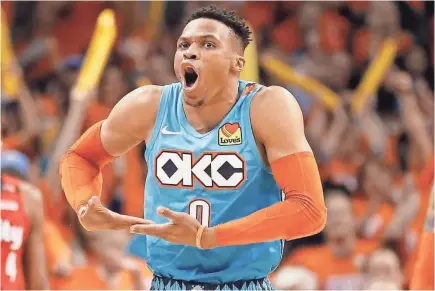  ?? ALONZO ADAMS/USA TODAY SPORTS ?? Thunder guard Russell Westbrook, mimicking rocking a baby after scoring against the Trail Blazers, has had an ongoing issue with a columnist since January.