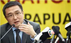  ??  ?? Zhang Xiaolong, a spokesman from the Chinese foreign ministry, speaks at a press conference during the Asia-Pacific Economic Cooperatio­n summit in Port Moresby. — AFP photo