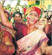  ?? AP ?? BJP supporters celebrate the victory in Assam on Thursday.