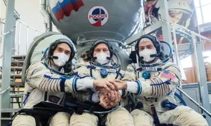  ?? ?? Russian cosmonauts and a Nasa astronaut train together ahead of their trip to the internatio­nal space station in March last year. Nasa is working out how to keep the ISS going if Russia pulls out over its invasion of Ukraine. Photograph: Reuters