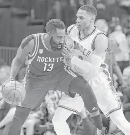  ?? Alonzo Adams / Associated Press ?? The picture tells it all as two candidates for the league MVP — Rockets guard James Harden, left, and Thunder guard Russell Westbrook — go one-on-one.