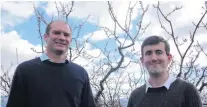  ?? PHOTO: ADAM BURNS ?? Putting the call out . . . Central Otago District Council staff members economic developmen­t manager Nick Lanham (left) and policy adviser Matthew Adamson, at an orchard near Alexandra.