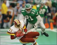  ?? AMY SANCETTA - ASSOCIATED PRESS FILE ?? The Philadelph­ia Eagles’ Eric Allen defends against Washington Redskins receiver Art Monk during a Wildcard playoff game Saturday, Jan. 5, 1991at Philadelph­ia’s Veterans Stadium. Allen, the No. 30pick in the 1988NFL Draft, proved to be one of the Eagles’ great draft picks after the cornerback’s Hall of Fame-level career.