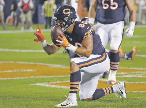  ?? NAM Y. HUH/ASSOCIATED PRESS ?? Chicago Bears tight end Trey Burton celebrates his touchdown during the first half of Monday’s game against the Seattle Seahawks in Chicago. The Bears won 24-17.