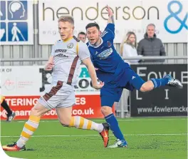  ??  ?? Mitch Megginson (right) scores to make it 1-0 to Cove