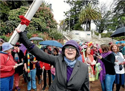  ?? PHOTO: MARTIN DE RUYTER/STUFF ?? Elizabeth Coleman, a relative by marriage of Kate Sheppard, leads walkers from the Church Steps in Nelson during the Walk For Kate Suffrage Day march.