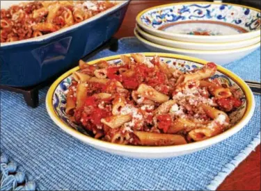  ?? PHOTO BY EMILY RYAN ?? Can’t find whole-wheat rigatoni? Substitute penne in this easy and satisfying baked pasta dish.