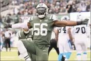  ?? Bill Kostroun / Associated Press ?? New York Jets inside linebacker Demario Davis reacts after a play against the Carolina Panthers during the second half on Nov. 26 in East Rutherford, N.J. Davis is having the best season of his career in his sixth year in the NFL.