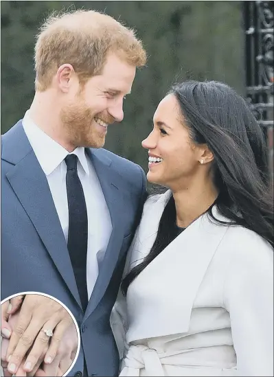  ?? PICTURES: DOMINIC LIPINSKI/PA WIRE. ?? HAPPY COUPLE: Prince Harry and Meghan Markle at Kensington Palace and inset, Meghan’s engagement ring.