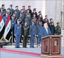  ?? HANDOUT / AFP ?? Haider al-Abadi anunciant la victòria sobre l’EI