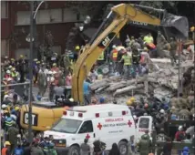  ?? MOISES CASTILLO, THE ASSOCIATED PRESS ?? Rescue personnel work on a collapsed building Wednesday, a day after a devastatin­g 7.1 earthquake in Mexico City.