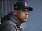  ?? DAVID J. PHILLIP — THE ASSOCIATED PRESS, FILE ?? Former Red Sox manager Alex Cora waits for the start of Game 5of the World Series against the Dodgers in 2018. Cora was fired by the Red Sox on Tuesday.