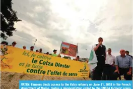  ??  ?? VATRY: Farmers block access to the Vatry refinery on June 11, 2018 in the French department of Marne, during a demonstrat­ion called by the FNSEA farmers’ union to protest plans to import palm oil for use in biofuels, a move farmers denounce as unfair competitio­n which jeopardize­s their livelihood. — AFP