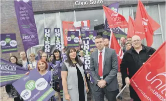  ??  ?? Unison and Unite rally ahead of full council meeting. Front, Couns Rebecca Atkinson and Kevin Johnson.