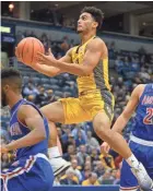  ??  ?? Marquette guard Markus Howard is averaging 21.8 points per game.