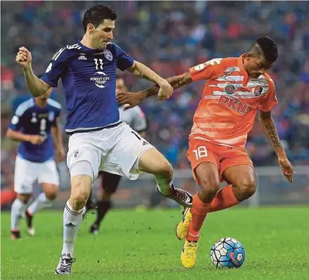  ??  ?? Darul Ta’zim will release their top scorer Jorge Pereyra Diaz (left) if the price is right. Pic by Hasriyasya­h Sabudin