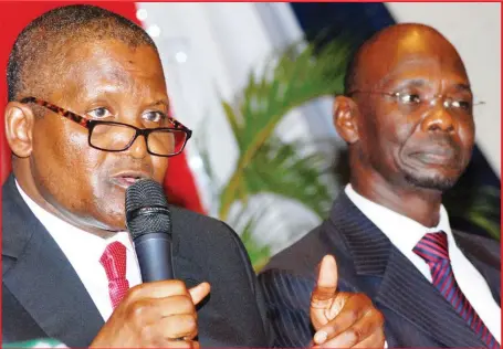  ??  ?? L-R: Chairman, Dangote Sugar Refinery Plc, Aliko Dangote, and acting Group Managing Director, Dangote Sugar Refinery, Mr. Abdullahi Sule, during the annual general meeting of Dangote Sugar Refinery, held in Lagos… yesterday