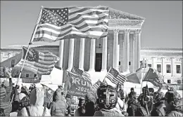  ?? ANNA MONEYMAKER/THE NEW YORK TIMES ?? Supporters of President Trump rally Tuesday outside the U.S. Supreme Court in Washington. The court refused to call into question the certificat­ion process in Pennsylvan­ia.