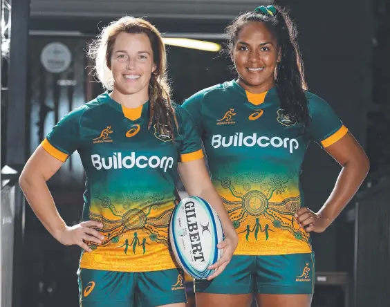  ?? Picture: Glenn Hampson ?? Wallaroos players Lori Cramer and Mahlia Murphy wearing the First Nations jersey at the Jellurgal Aboriginal Cultural Centre.