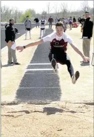  ?? MARK HUMPHREY ENTERPRISE-LEADER ?? Lincoln freshman Eli Rich took third place in boys triple jump competitio­n during the 4A-1 District Junior High Track and Field Meet hosted by Gravette Thursday. Rich reached a distance of 37.06.75. Lincoln won the boys team championsh­ip with 128...