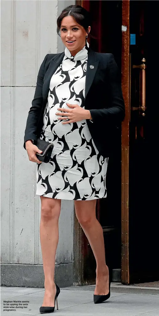  ?? AP ?? Meghan Markle seems to be upping the ante style-wise during her pregnancy.