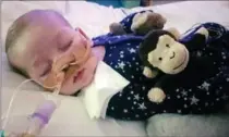  ?? THE ASSOCIATED PRESS ?? Eleven-month-old Charlie Gard is at the centre of a battle between his parents and the state about his continuing life support.