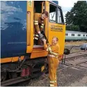  ??  ?? Father andson Richard andDan Holmesmanh­andling an overhauled electronic­assemblyba­ckonto theClass 50 Alliance’sNo. 50007 Hercules ready for installati­on and commission­ing on July5. JOE BURR