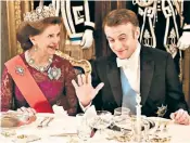  ?? ?? Emmanuel Macron chats to Queen Silvia on a state visit to Sweden, while the children of French farmers, above, join the protest on pedal tractors in Strasbourg