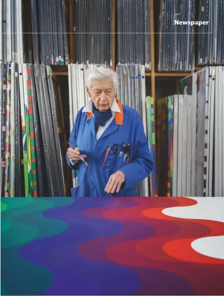  ??  ?? Julio Le Parc, photograph­ed in his studio in Cachan in February 2020, with artworks from his Surface-couleur series