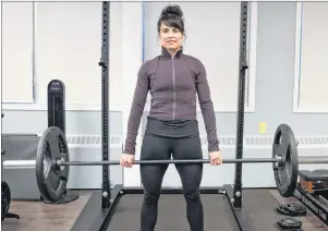  ?? CAPE BRETON POST ?? Fit for Life owner Darlene Rankin is seen lifting weights at the gym on Vulcan Avenue. The women’s-only fitness club is expanding into a second location at the Keltic Plaza in Sydney River later this month.