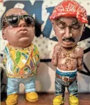  ?? EBONY COX / MILWAUKEE JOURNAL SENTINEL ?? Figures of The Notorious B.I.G. and Tupac Shakur can be found together in Antonia Anderson’s hip-hop museum located inside her Milwaukee apartment.