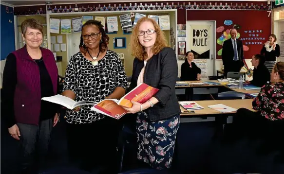  ?? Photo: Bev Lacey ?? NEW METHODS: Literary professors (from left) Dr Cynthia Brock, Dr Fenice Boyd and Dr Beryl Exley visited Toowoomba Grammar Junior School to help teachers develop new strategies to teach children spelling.