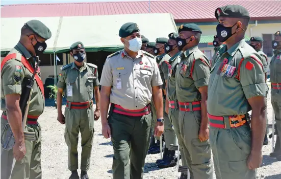  ?? Photo: Republic of Fiji Military Forces ?? Second from left: Republic of Fiji Military Forces (RFMF) Major Praneel Singh with RFMF Commander Major-General Ro Jone Kalouniwai inspecting the guard of honour at Blackrock Camp Nadi.